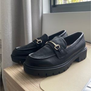 Black loafers